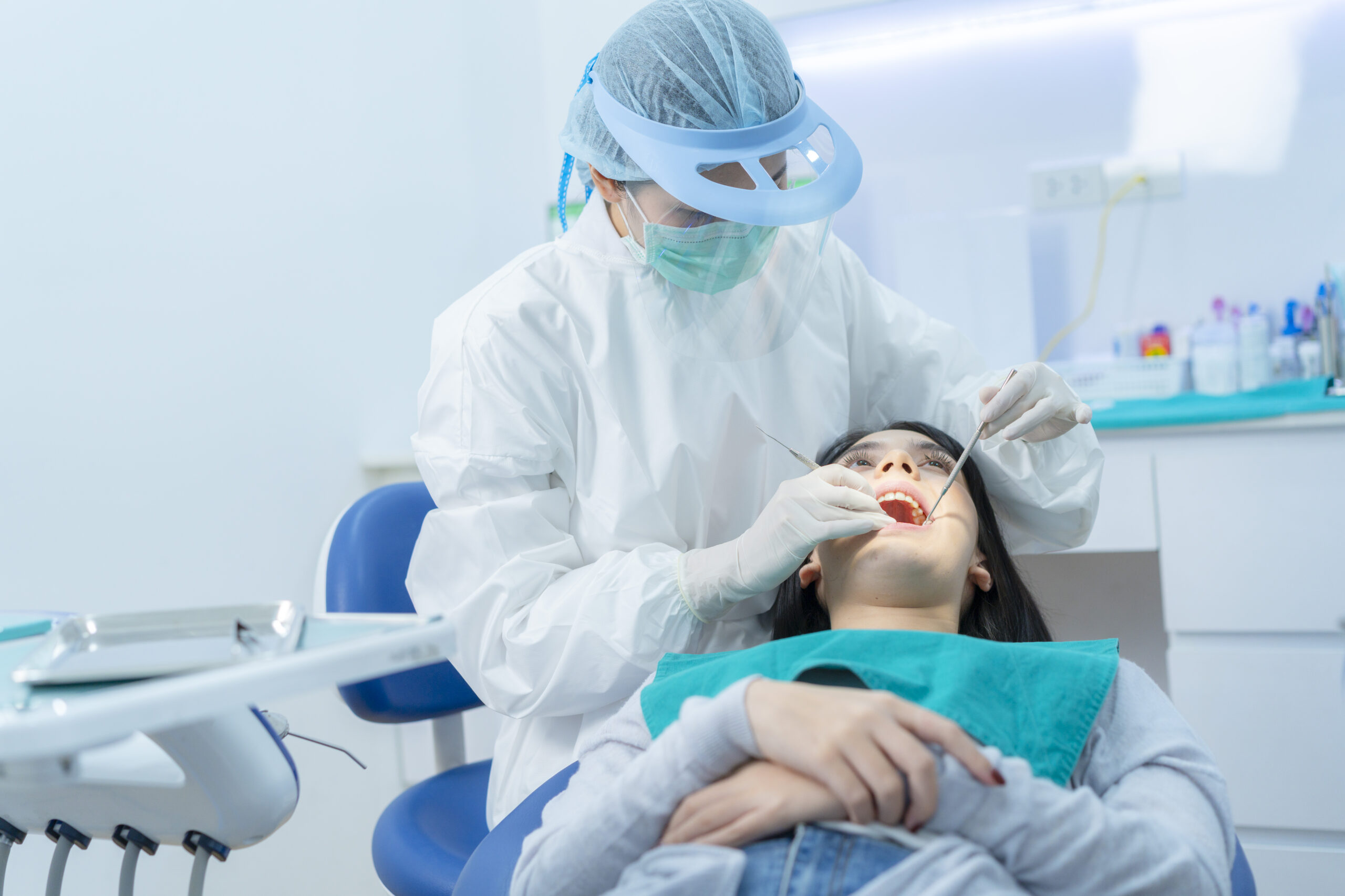 The woman visiting for consultation and caring for her oral health 